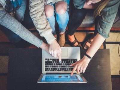 Group With Laptop